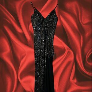 black sparkly, sequined dress with very long slit on left side, size 3